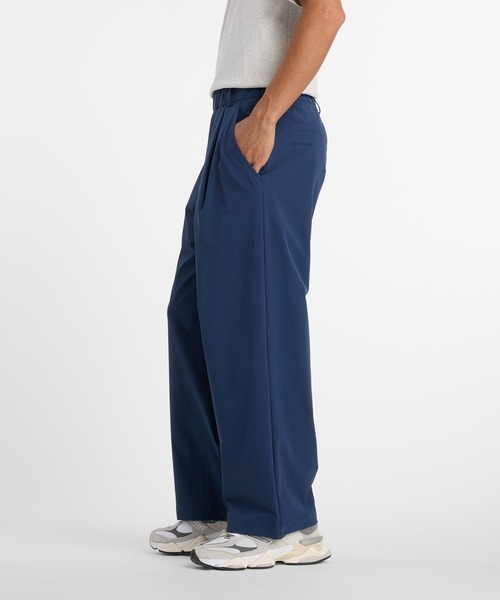 New Balance（ニューバランス） スラックス NB GREY ワイドパンツ