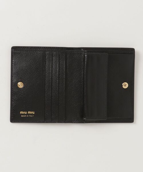 ［美品］MIU MIU 二つ折り財布 黒 miu miu（ミュウミュウ） 二つ折り 財布 - ブラック レディース