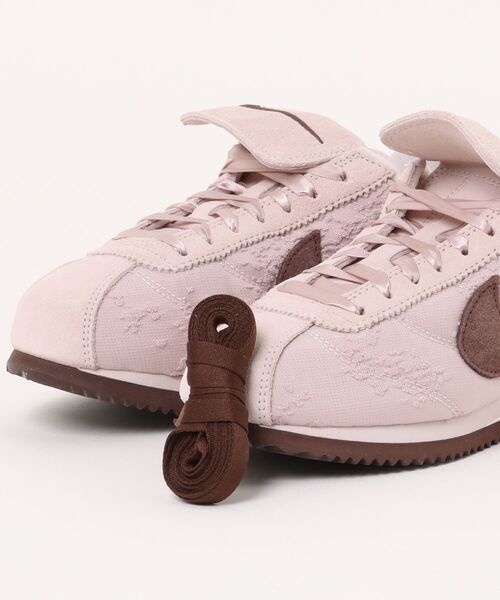 「NIKE」 ローカットスニーカー 25糎 さくら色 レディース