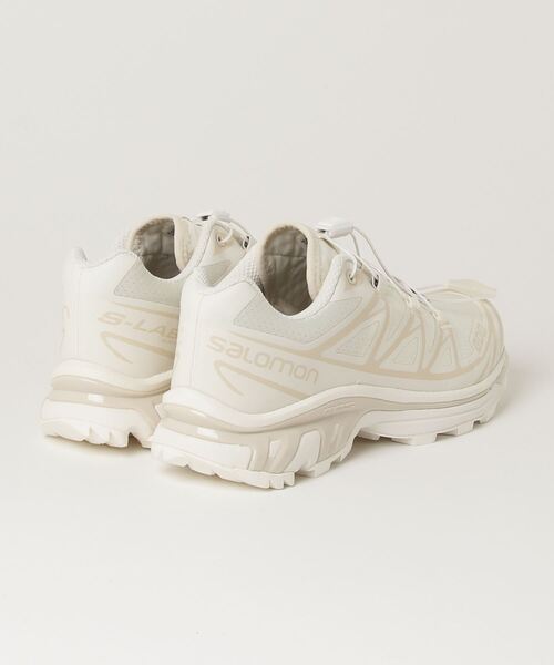 「SALOMON」 ローカットスニーカー 25cm オフホワイト レディースの画像
