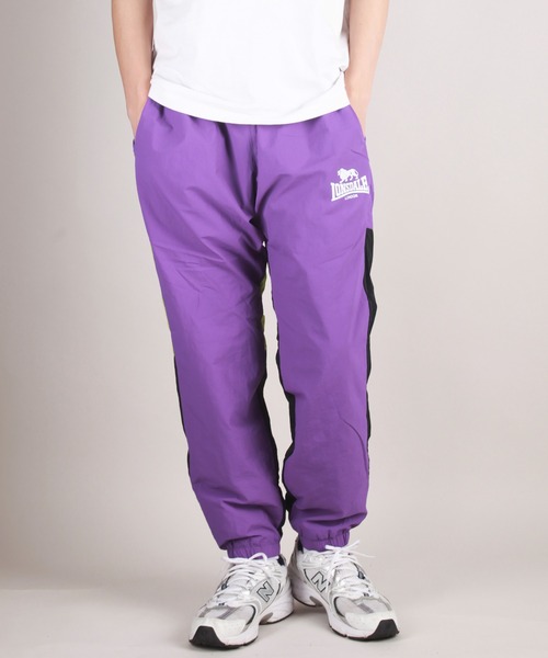 HIDE AND SEEK - NYLON TRACK PANTS (BLACK) / ナイロントラック
