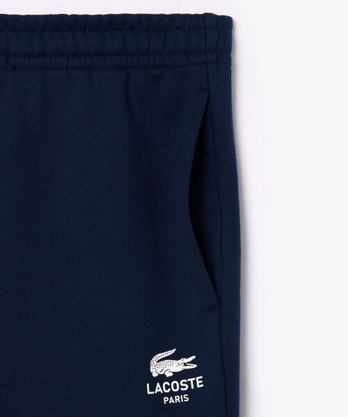 「LACOSTE」 スウェットパンツ L ワイン メンズの画像