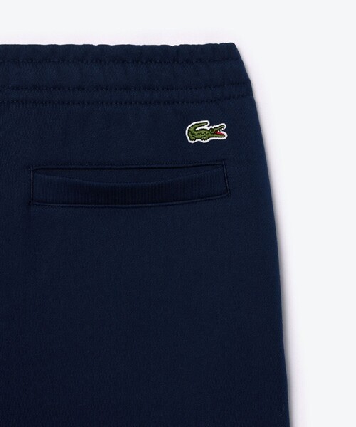 「LACOSTE」 スウェットパンツ L ワイン メンズの画像