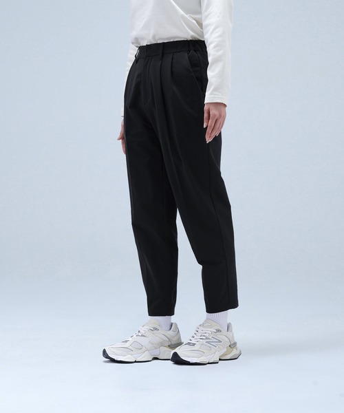 New Balance（ニューバランス） ワイドパンツ スラックス パンツ MET24