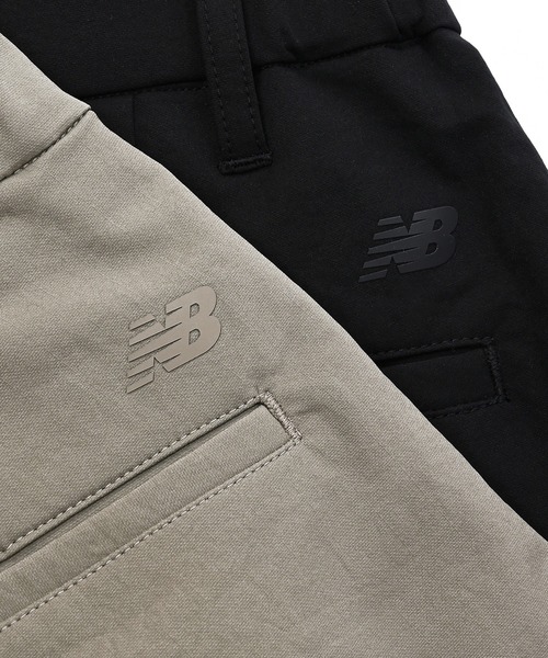 New Balance（ニューバランス） ワイドパンツ スラックス パンツ MET24