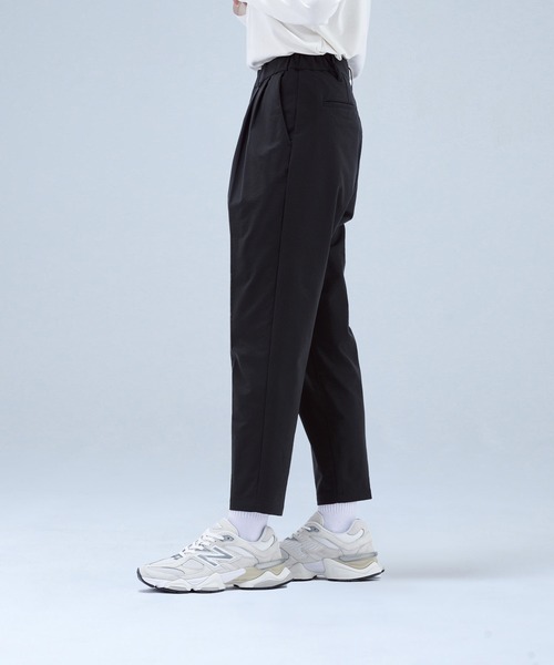 New Balance（ニューバランス） ワイドパンツ スラックス パンツ MET24