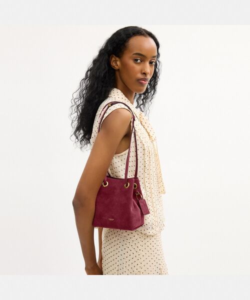 COACH レディースショルダーバッグ（色：ピンク系）｜バッグ