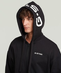 パーカー 「一部店舗限定」LOOSE HOODED ZIP SWEAT/オーバーサイズフードロゴジップアップパーカー メンズ レディース
