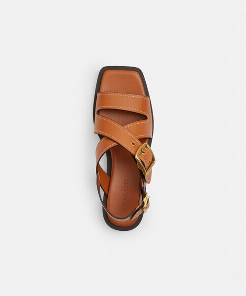 上品に足元を飾る【COACH】アーカイブバックルフラットサンダル アーカイブ バックル フラット サンダル（サンダル）｜COACH