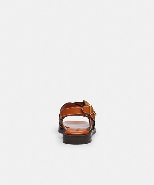 上品に足元を飾る【COACH】アーカイブバックルフラットサンダル COACH サンダル アーカイブ バックル フラット レディース