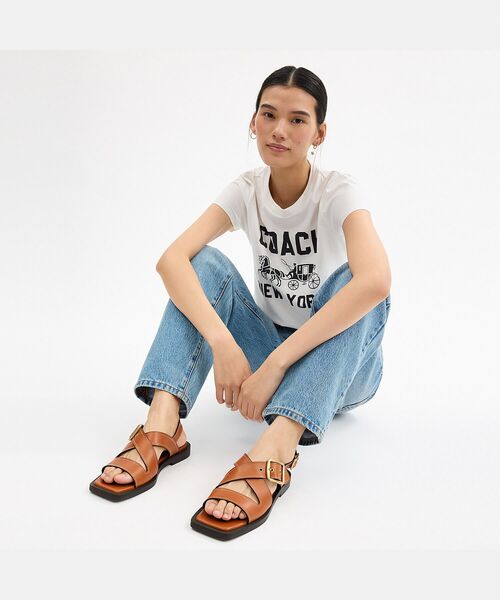 上品に足元を飾る【COACH】アーカイブバックルフラットサンダル COACH サンダル アーカイブ バックル フラット レディース