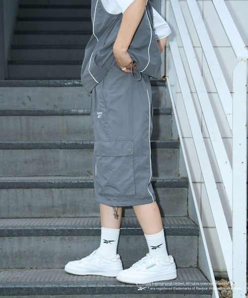 Reebok別注】ナイロンパイピングカーゴオーバーパンツ