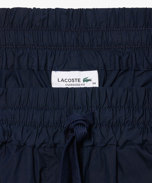 [LACOSTE] брюки-чинос 36 темно-синий женский 