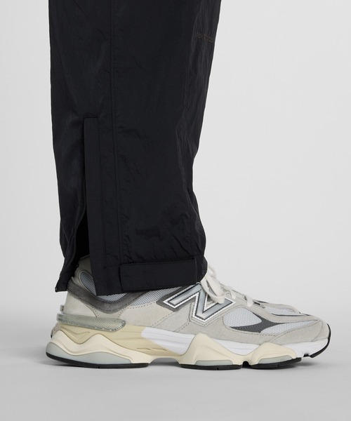 New Balance（ニューバランス） スラックス NB GREY テーパードパンツ