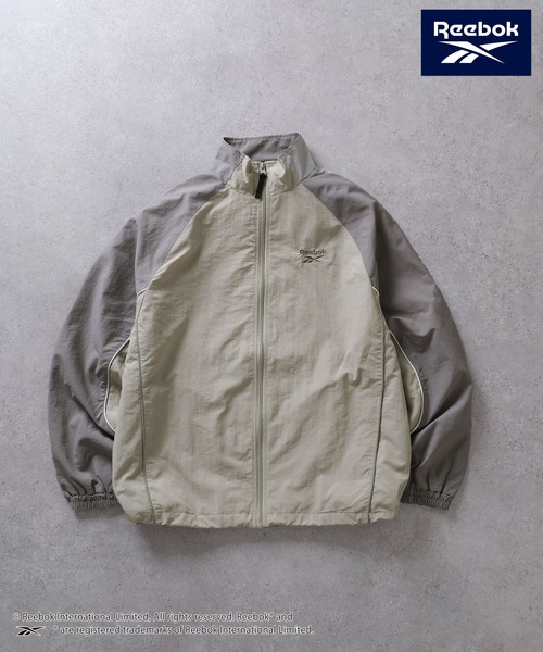 ドロストナイロンジャケット　Reebok　グレー Reebok（リーボック）の「【REEBOK】 ラグラン 袖ライン