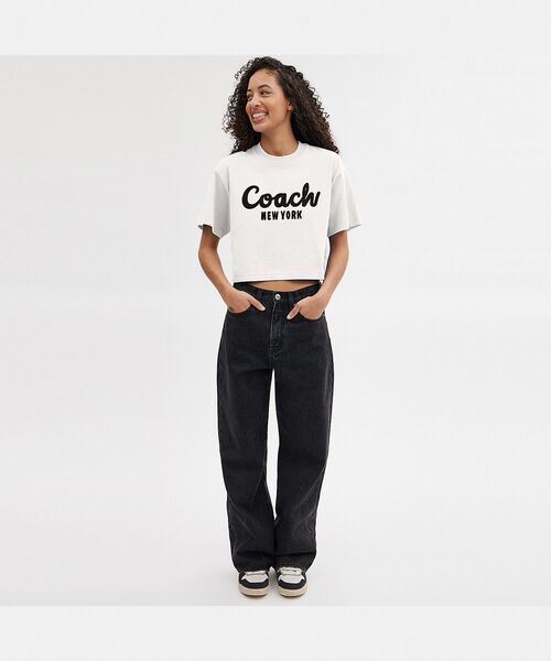 「COACH」 半袖Tシャツ MEDIUM ホワイト系その他 レディースの画像
