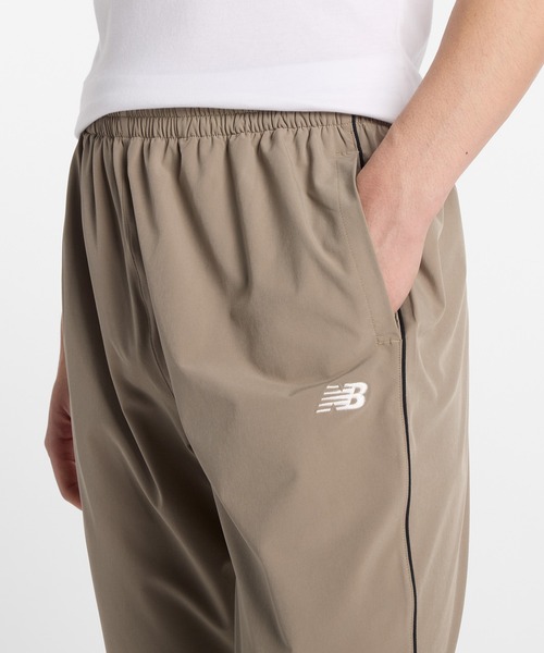 New Balance スウェットパンツ ジャージ ウーブントラックス
