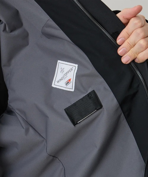 ダウンジャケット ダウン 「White Mountaineering/ホワイトマウンテニアリング」WINDSTOPPER COAT メンズの画像