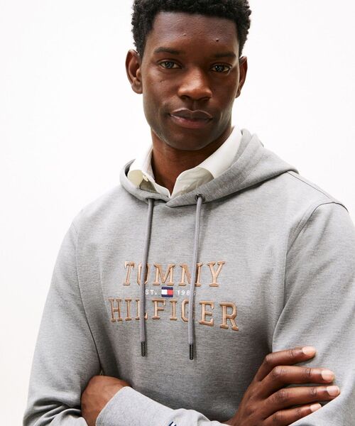 TOMMY HILFIGER（トミー・ヒルフィガー） トレーナー スウェット アイ