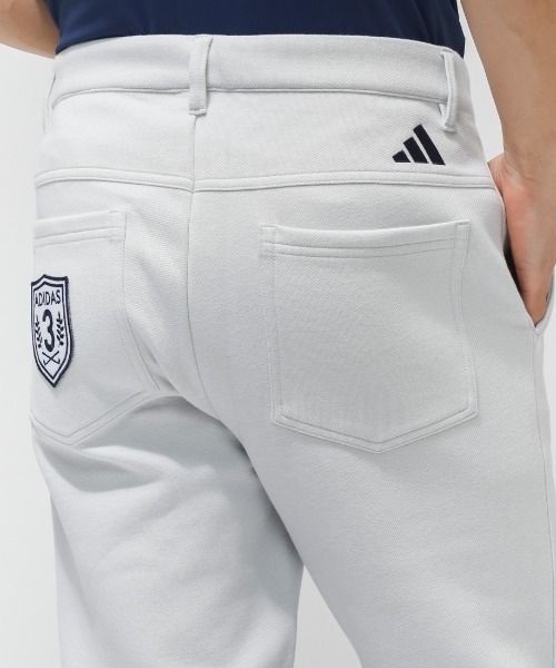 adidas（アディダス） スラックス バックグラフィックアンクルパンツ