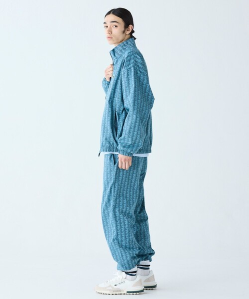 LACOSTE スウェットパンツ ジャージ モノグラムジャカード撥水