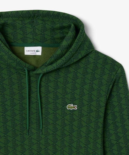 LACOSTE パーカー オールオーバーモノグラムスウェット
