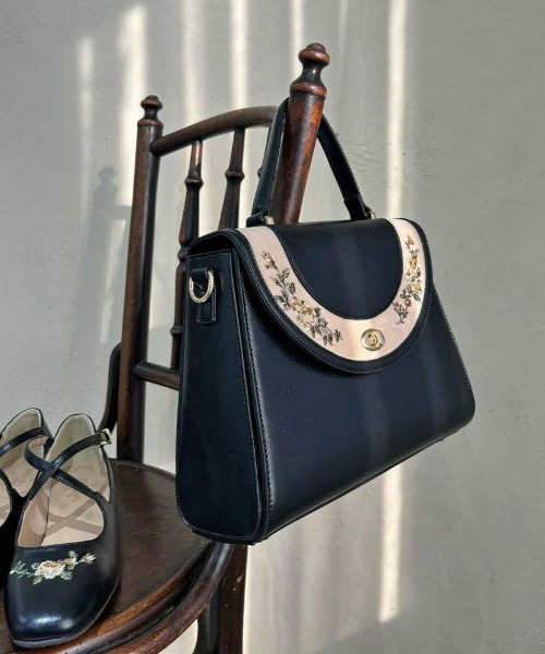 an another angelus（アンアナザーアンジェラス） ハンドバッグ