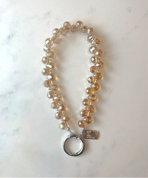 CRYSTAL TAN/GOLD クリスタルガラスビーズストラップ付き lit.Cy（リットシー） クリスタルビーズ ショート スマホストラップ