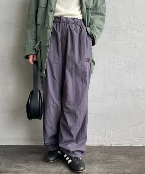 umbro（アンブロ） パンツ 別注 ナイロントラックパンツ レディース