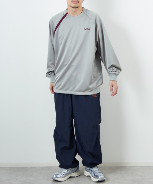 umbro（アンブロ） パンツ 別注 ナイロントラックパンツ レディース