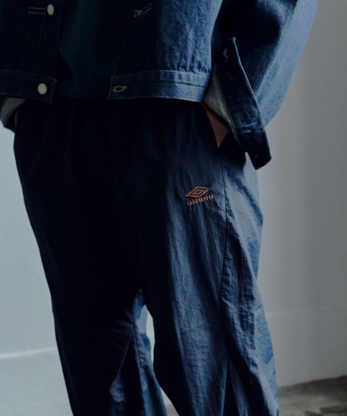 umbro（アンブロ） パンツ 別注 ナイロントラックパンツ レディース
