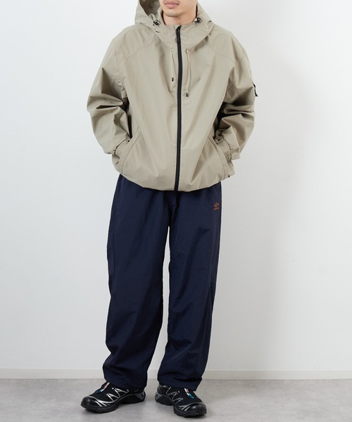 umbro（アンブロ） パンツ 別注 ナイロントラックパンツ レディース