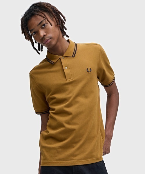 FRED PERRY メンズポロシャツ（色：オレンジ系）｜トップス