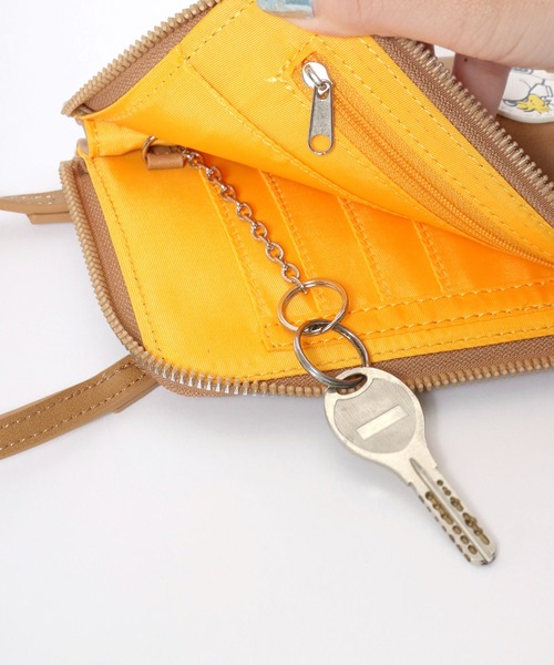 稀少　コーチ　スヌーピーコラボ　ポーチ　黄色　small folio PEANUTS ポーチ FILA×PEANUTSコラボ スヌーピーキャラクターワッペン