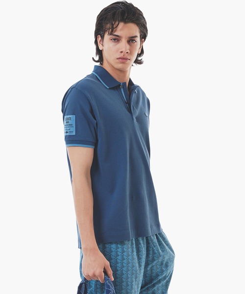 LACOSTE 日本製 ワイド ポロシャツ 鹿の子 ドロップ スリット 紺 LACOSTE ポロシャツ スリーブネームパッチ 配色ライン鹿の子地