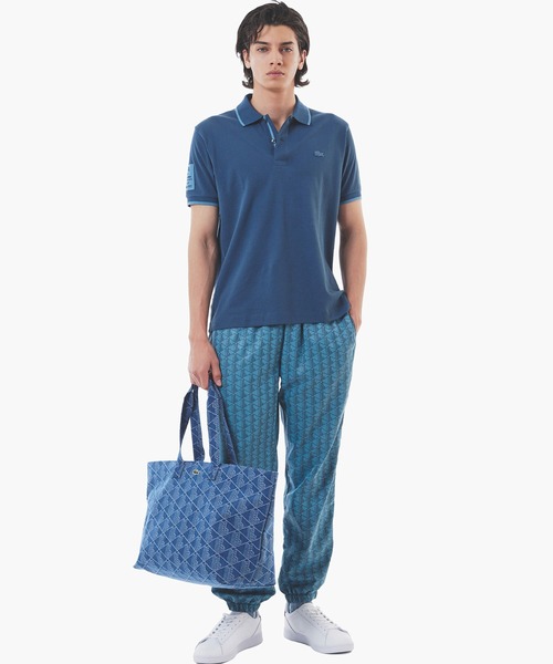 LACOSTE 日本製 ワイド ポロシャツ 鹿の子 ドロップ スリット 紺 LACOSTE ポロシャツ スリーブネームパッチ 配色ライン鹿の子地