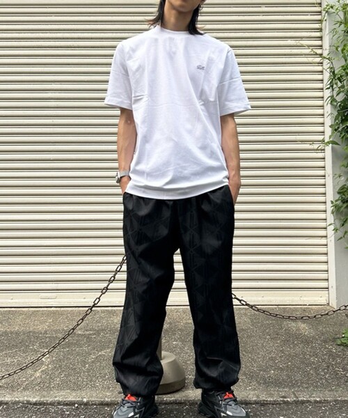 LACOSTE パンツ モノグラム柄ジャカード ナイロントラックパンツ