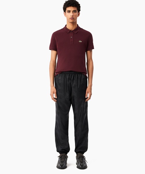 龍LACOSTE トラックパンツ値下げ可能 LACOSTE パンツ モノグラム柄ジャカード ナイロントラックパンツ