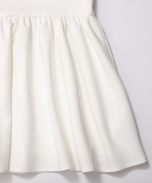Fit more（フィットモア） シャーリングスリーブペプラムトップス