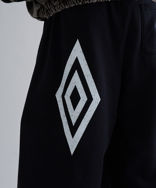 ワイドパンツ スウェットパンツ ジャージ UMBRO × EPNK Curved Tack 