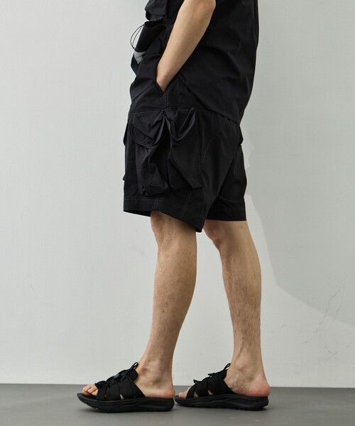 パンツ 「and wander/アンドワンダー」multi pocket short pants メンズの画像
