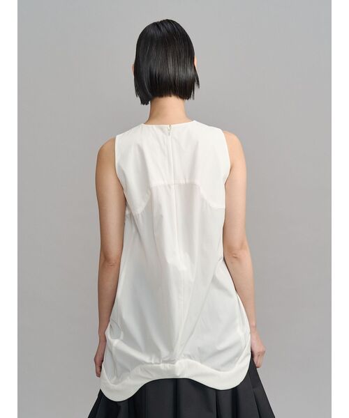 UN3D. ノースリーブTシャツ　ホワイト UN3D.（アンスリード） タンクトップ ノースリーブ WAVE HEM PADDED