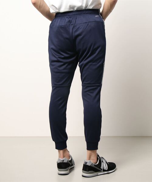 New Balance ネイビージャージパンツ new balance ネイビー ジャージパンツ - メルカリ