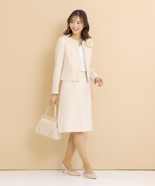 CARETTE スーツ ミックスツイードのノーカラージャケットと