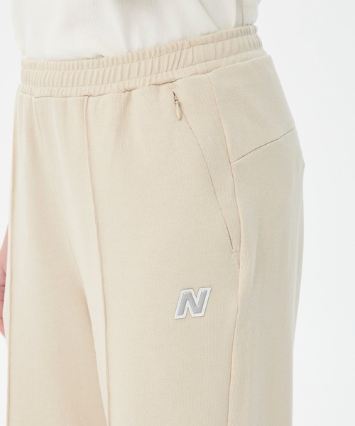 New Balance スウェットパンツ ジャージ MET24 N Wide Pants