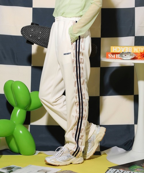 NERDY スウェットパンツ ジャージ シンボルパターンブロックトラック