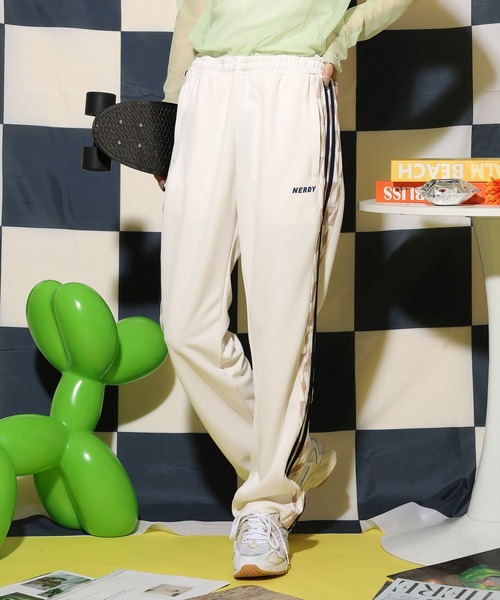 NERDY スウェットパンツ ジャージ シンボルパターンブロックトラック