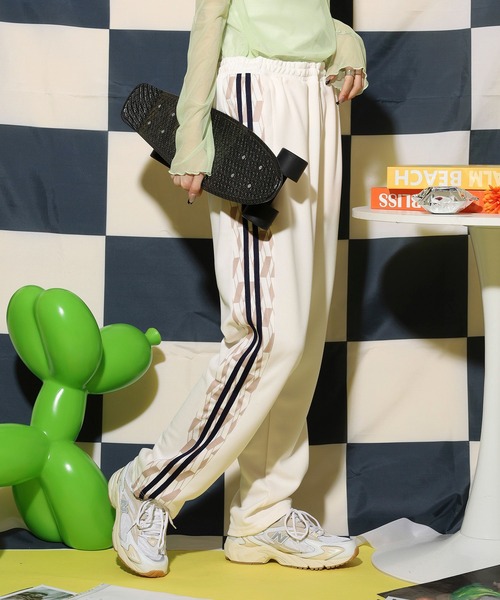 NERDY スウェットパンツ ジャージ シンボルパターンブロックトラック