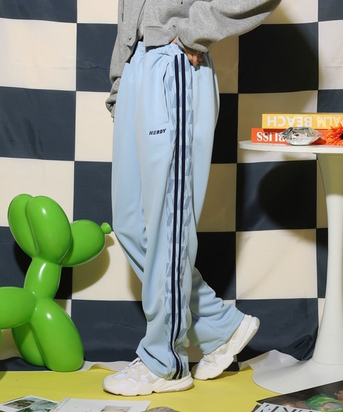 NERDY スウェットパンツ ジャージ シンボルパターンブロックトラック