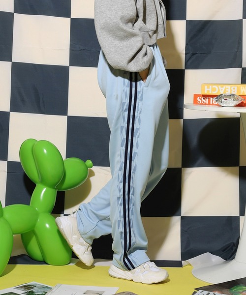 NERDY スウェットパンツ ジャージ シンボルパターンブロックトラック